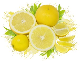 group of yellow lemons and grapefruits with green leaves isolated on white with clipping path