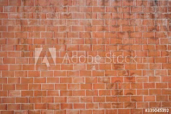 Grungy red brick wall background