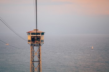 Guardhouse Beside Large Body of Water at Golden Hour