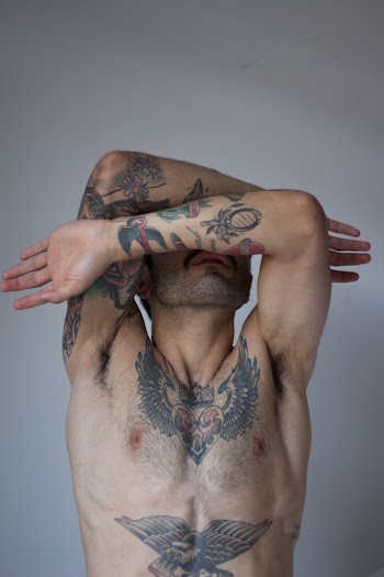 Haft Naked Man With Graywash Wings Chest Tattoo