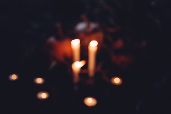 Halloween candles and pumpkins blur
