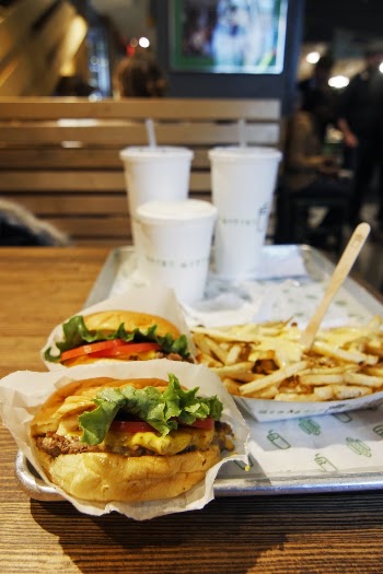 Hamburgers and Potato Fries on Tray