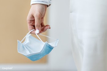 Hand holding a used face mask during coronavirus pandemic | Free  photo - 2296158