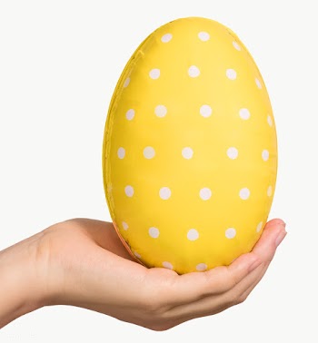 Hand holding a white polka dot patterned yellow egg design element | Free  transparent png - 2299578