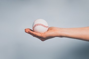 Hand Holding Baseball