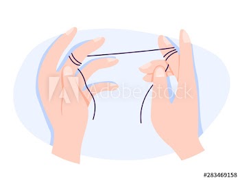 Hand holding dental floss