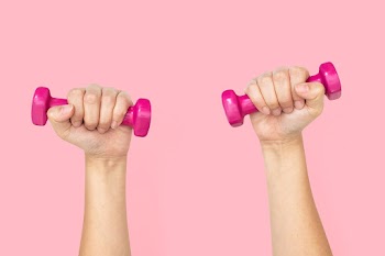 Hand holding dumbbells  in health and… | Free stock photo | High Resolution image