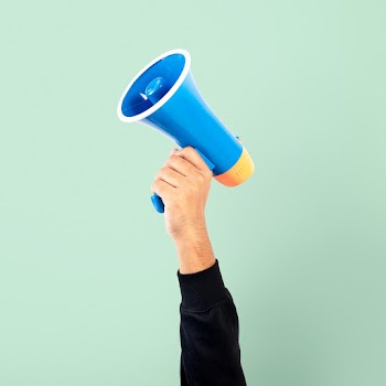 Hand holding megaphone marketing announcement… | Free stock photo | High Resolution image