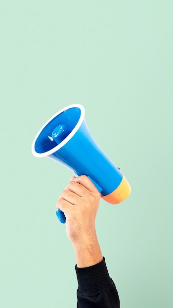 Hand holding megaphone marketing announcement… | Free stock photo | High Resolution image