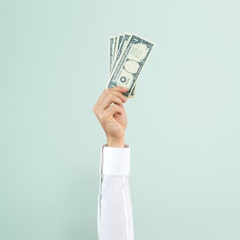 Hand holding money in finance concept | Free stock photo | High Resolution image