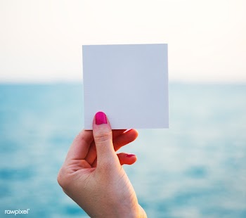 Hand holding perforated paper frame with ocea.. | Free stock psd mockup - 380035