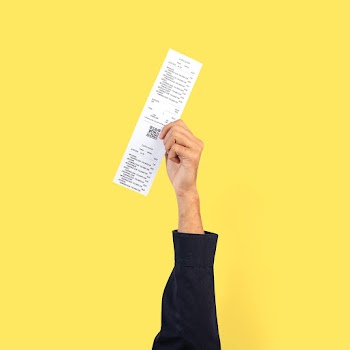 Hand holding receipt for shopping campaign | Free stock photo | High Resolution image