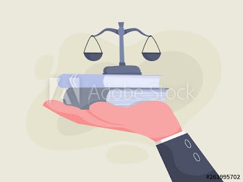 Hand holding scales and books