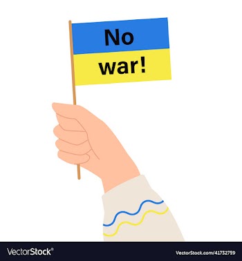 hand holds the ukrainian flag