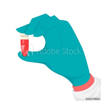 Hand in glove holding a test tube