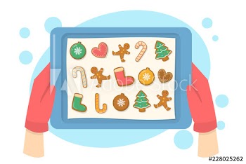 Hand in gloves holding tray with gingerbread