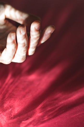 Hand In Light On Red