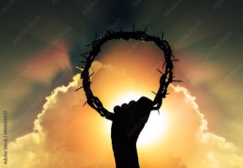 hand of Jesus christ with sky and rising sun, holding crown of thorns, critsão symbol of rebirth, faith and easter