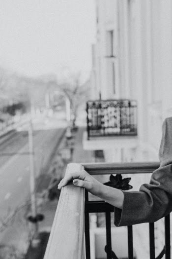 Hand on Balcony Railing · Free Stock Photo
