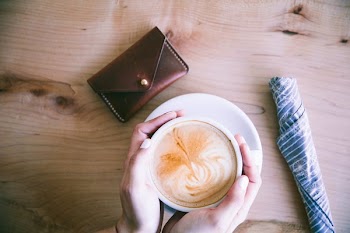 Hands Cupping Coffee