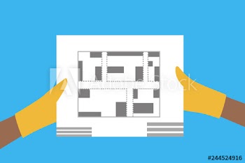 Hands holding a building plan