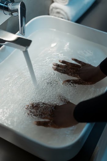 Hands Immersing in Sink with Water · Free Stock Photo