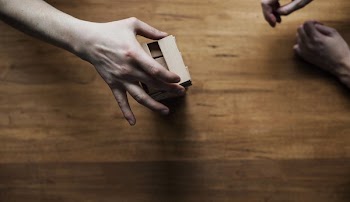Hands Reaching In To Play Games