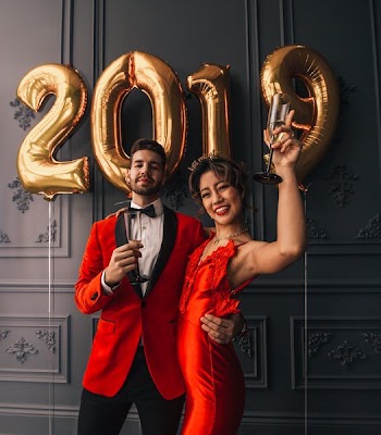 Handsome Couple In Red On New Year's Eve
