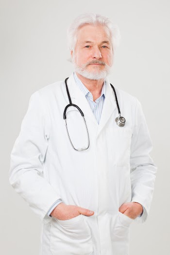 Handsome elderly doctor in uniform Free Photo