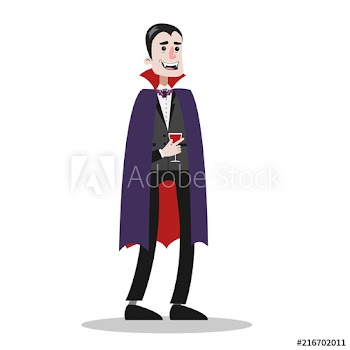 Handsome man in a vampire costume