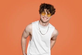Handsome man with curly hair | Free Photo - rawpixel