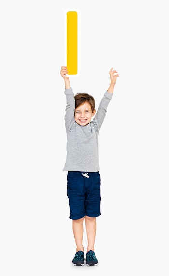 Happy boy holding the letter I | Free stock psd mockup - 491925