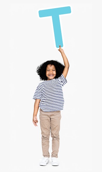 Happy boy holding the letter T | Free stock psd mockup - 491963