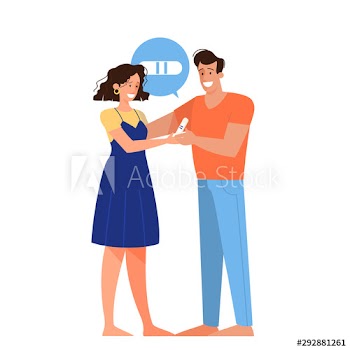Happy couple with a positive pregnancy test