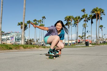 Happy girl skateboarding, fun outdoors sport… | Free stock photo | High Resolution image