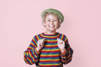 Happy girl wearing colorful knitwear, | Free Photo - rawpixel