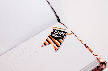 Happy Halloween paperclip in a notebook