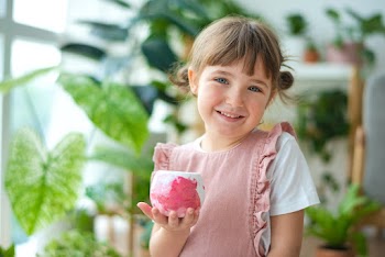 Happy kid at home DIY pot painting hobby | Free stock photo | High Resolution image