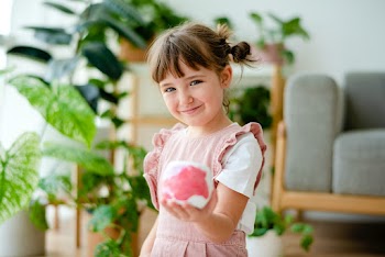 Happy kid at home DIY pot painting hobby | Free stock photo | High Resolution image