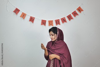 Happy Muslim family celebrating Eid Mubarak