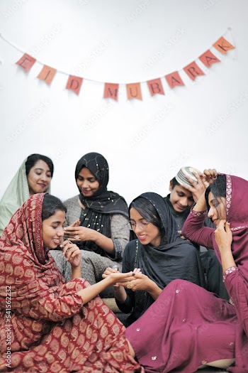 Happy Muslim family celebrating Eid Mubarak