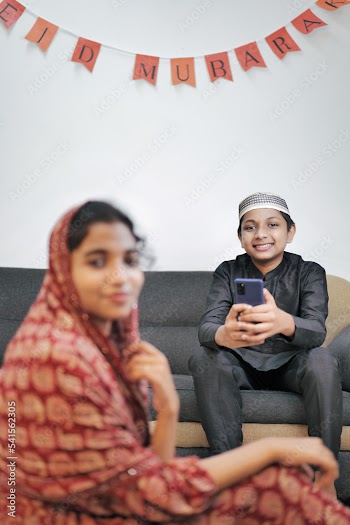Happy Muslim family celebrating Eid Mubarak