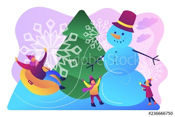 Happy people having fun outdoor in winter sledding and making snowman