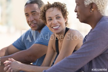 Happy senior friends talking