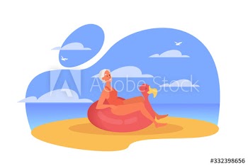 Happy senior woman spending time on the beach lying on a rubber