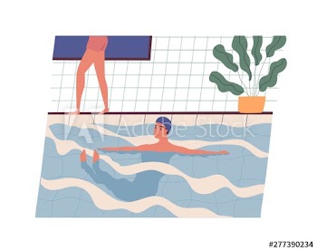 Happy smiling young man wearing swim cap swimming in pool