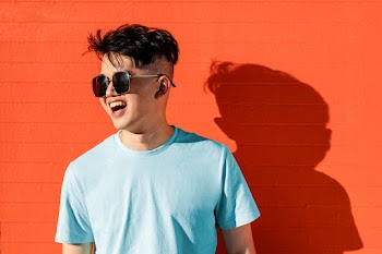 Happy teen portrait psd, bright wall layer | Free stock photo | High Resolution image