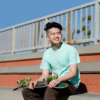Happy teen with skateboard, summer hobby… | Free stock photo | High Resolution image