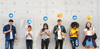 Happy teenagers addicted to their smartphones