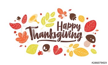 Happy Thanksgiving phrase handwritten with elegant calligraphic script and decorated by fallen autumn leaves and mushrooms